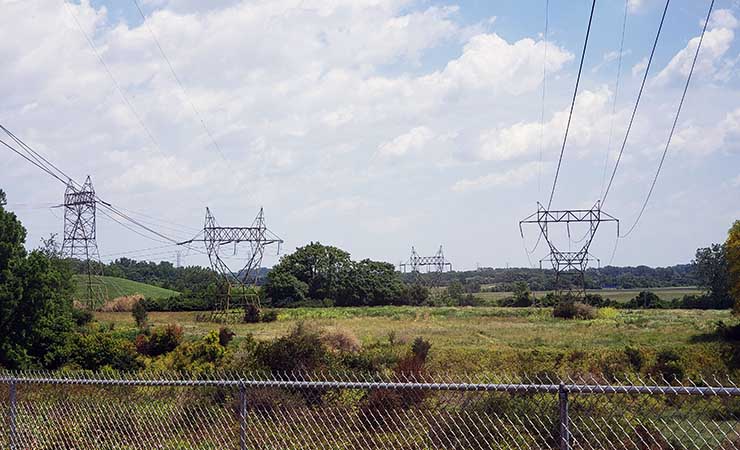 Power towers carrying high-capacity electricity onto the Quantum Loophole campus in Frederick County, Maryland. (Photo: RIch Miller)